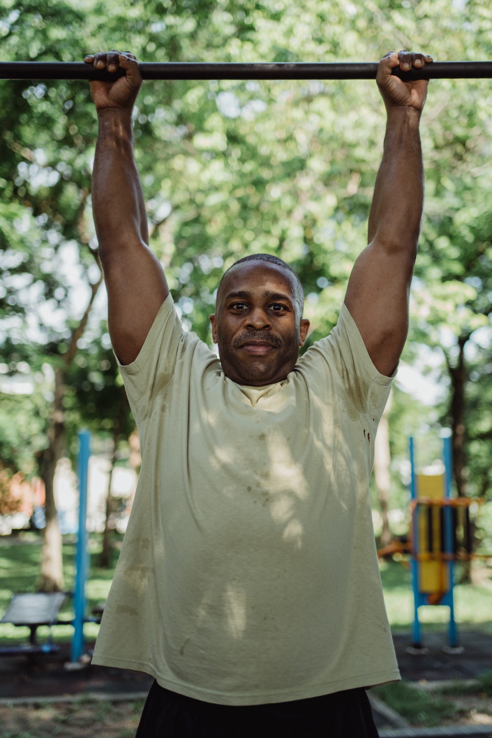 strong man exercising image Bioflex laser practitioner at Karen J Millers chiropractic